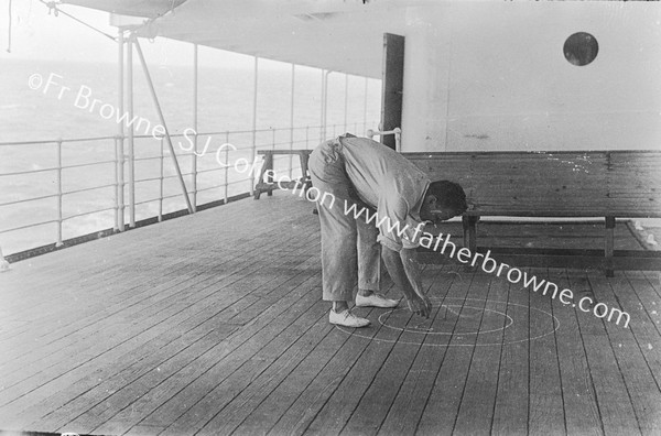 ON BOARD : FR. BROWNE PLAYING QUOITS